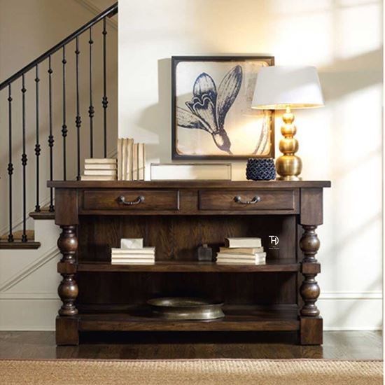 Shiva TV Console is handcrafted furniture with 2 drawers and 2 open shelves in solid Mango wood and has the most useful and elegant space for TV accessories. It can also be used as a console table.